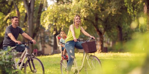 This image: stock image of a young family cycling through a 
					 green, open space. 
					 The map: the map shows an artist's sketch of how the proposed site
					 may look, overlaid with interactive markers detailing the proposed 
					 travel infrastructure, and the existing 410 bus route.